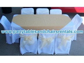 White rectangular table and folding chair covers for sale